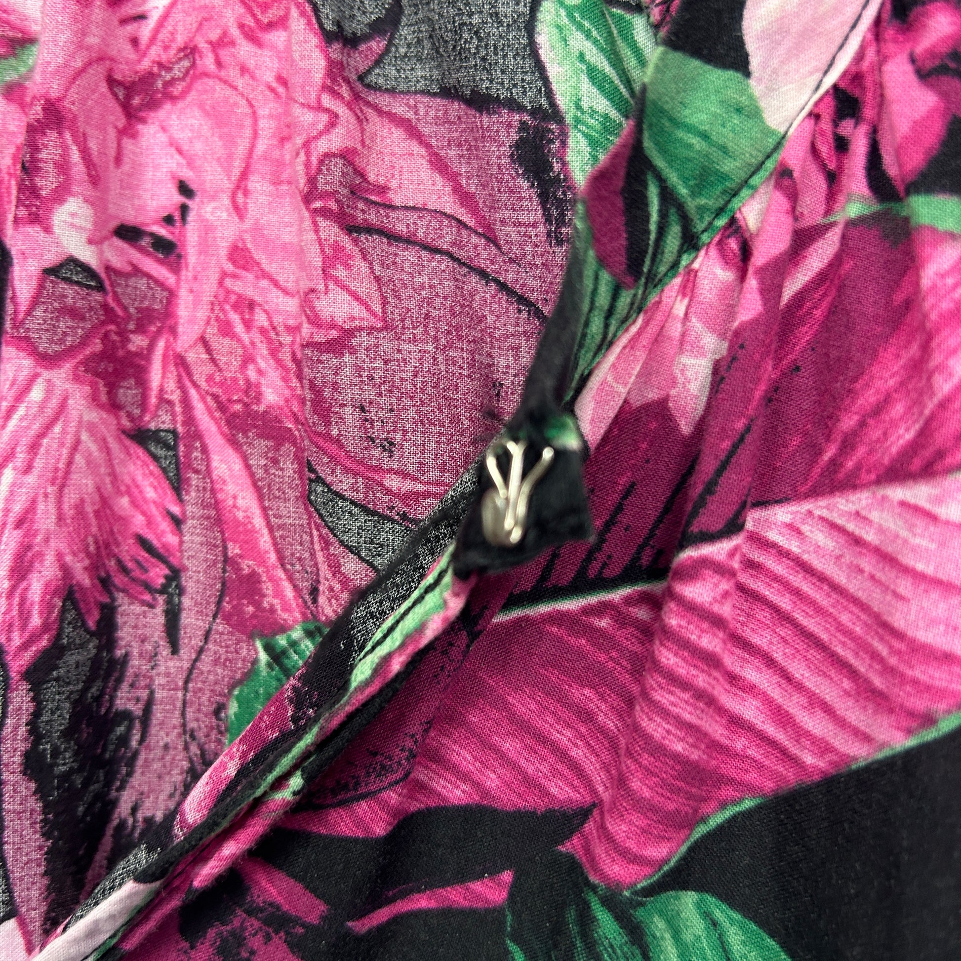 Pink floral fabric detail view