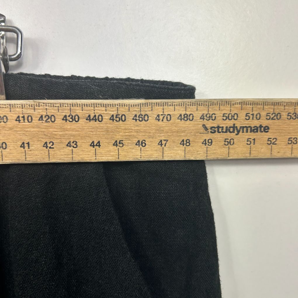 Black fabric measured with ruler detail view