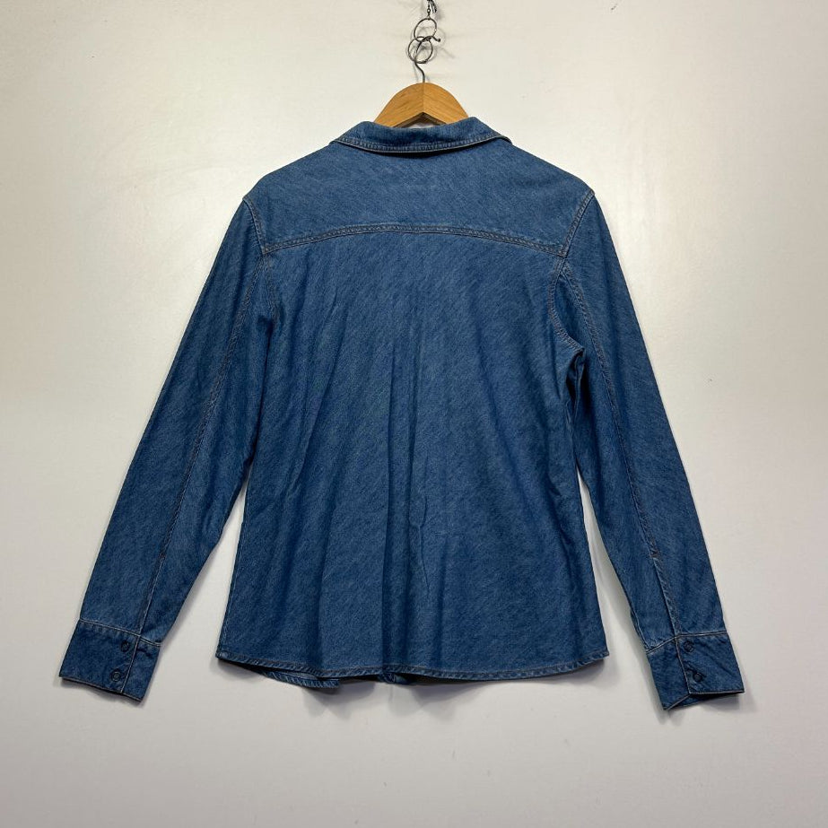 Blue denim shirt back view