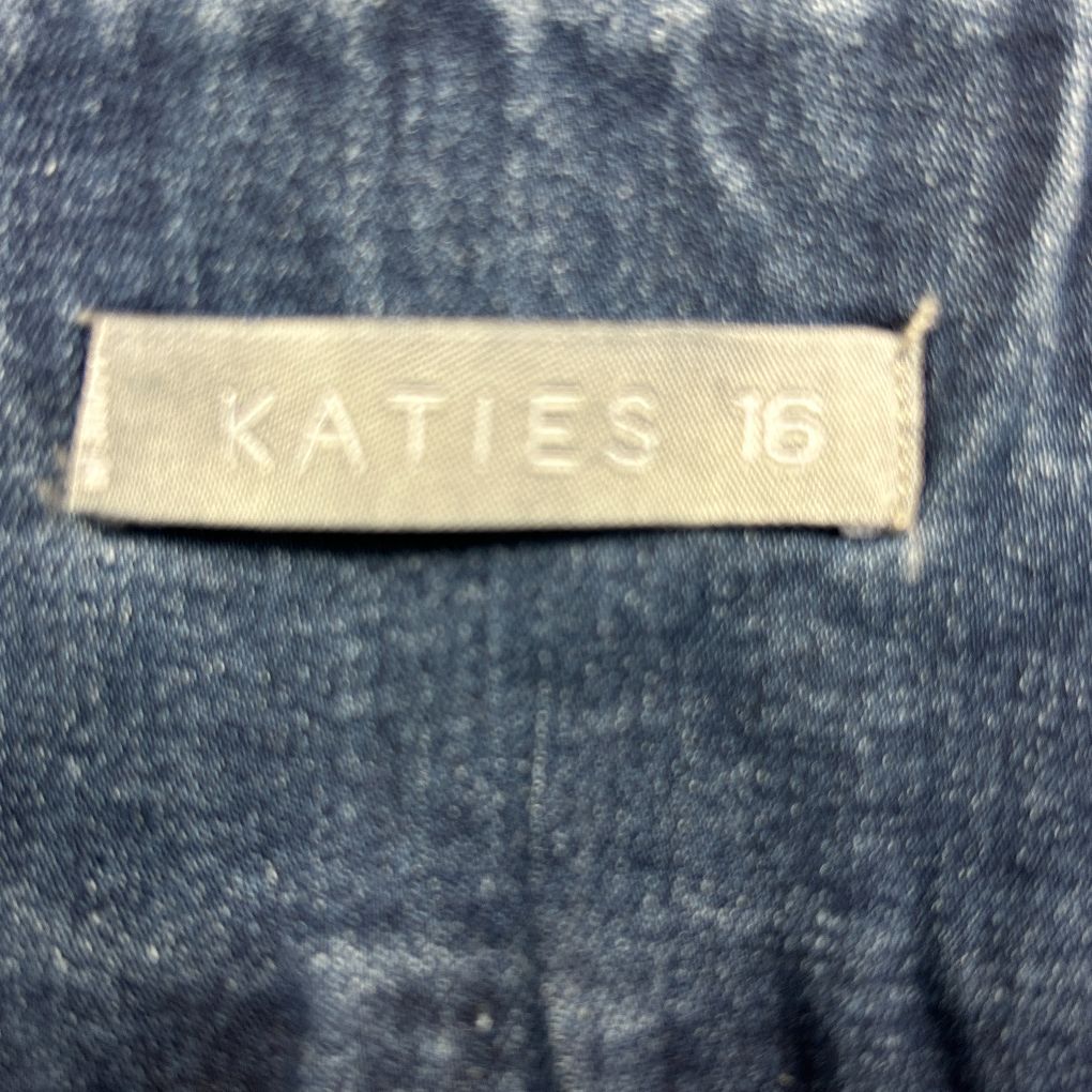 Katies brand label on blue denim detail view