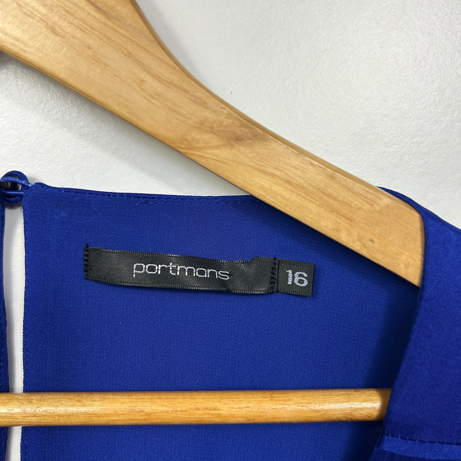 Blue long sleeve top label and detail view