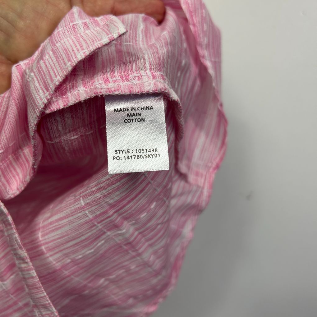 Pink striped shirt label detail view