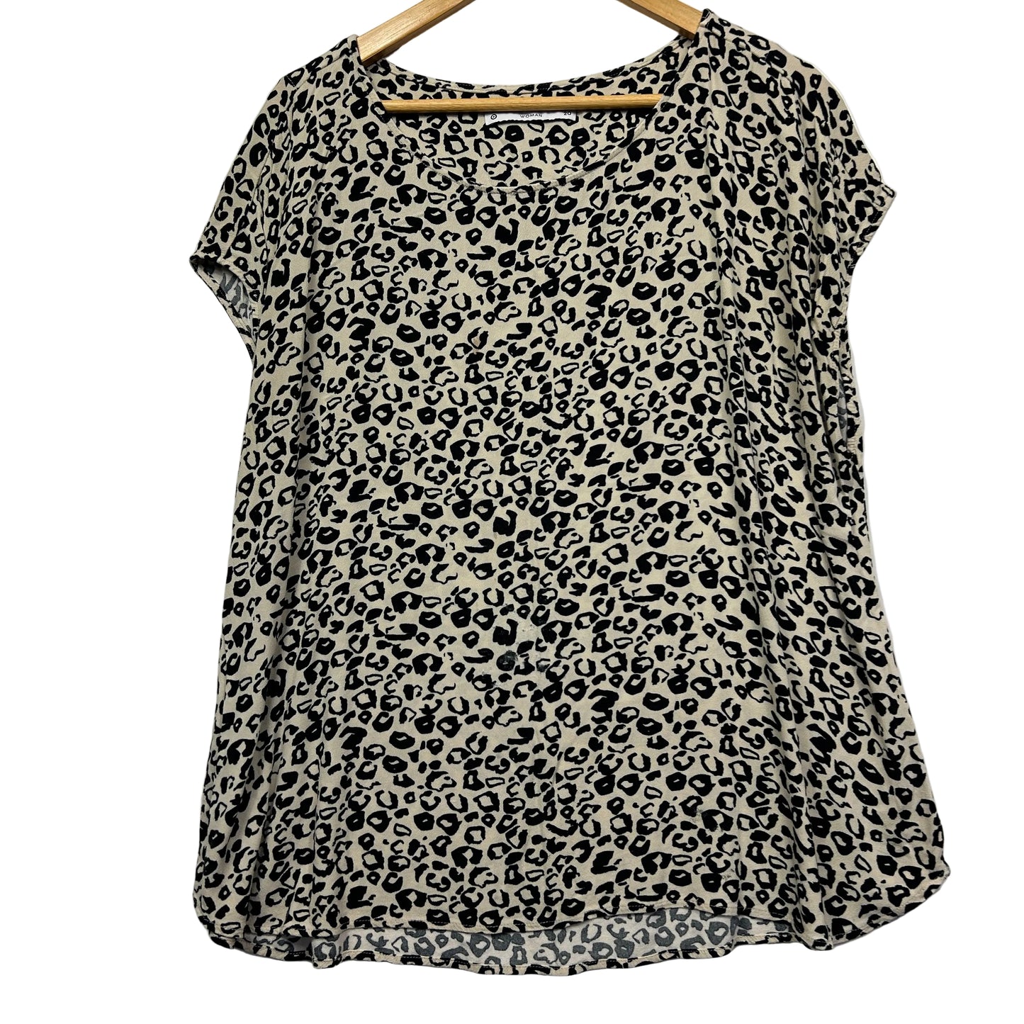 Black and cream leopard print short sleeve top front view