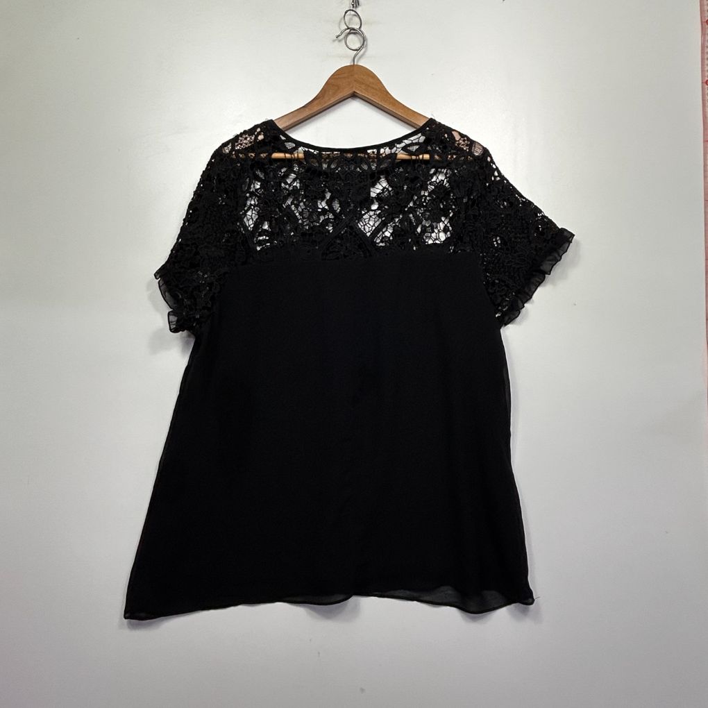 Black short sleeve top with lace yoke front view