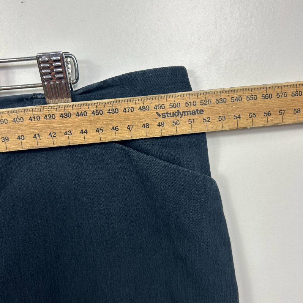 Navy blue fabric with measuring tape detail view