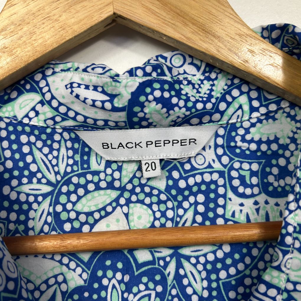 Black Pepper blue and white paisley patterned top label and size tag detail view