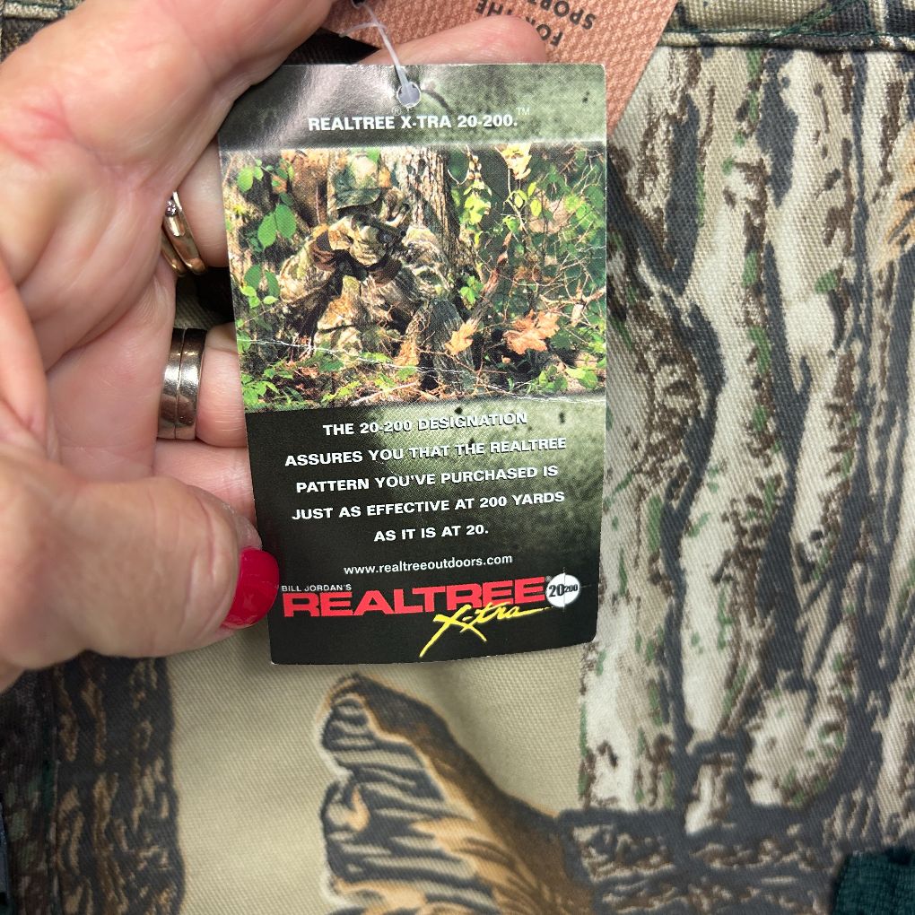 Camouflage print jacket label detail view