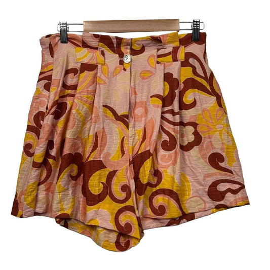Pink yellow and burgundy patterned shorts front view