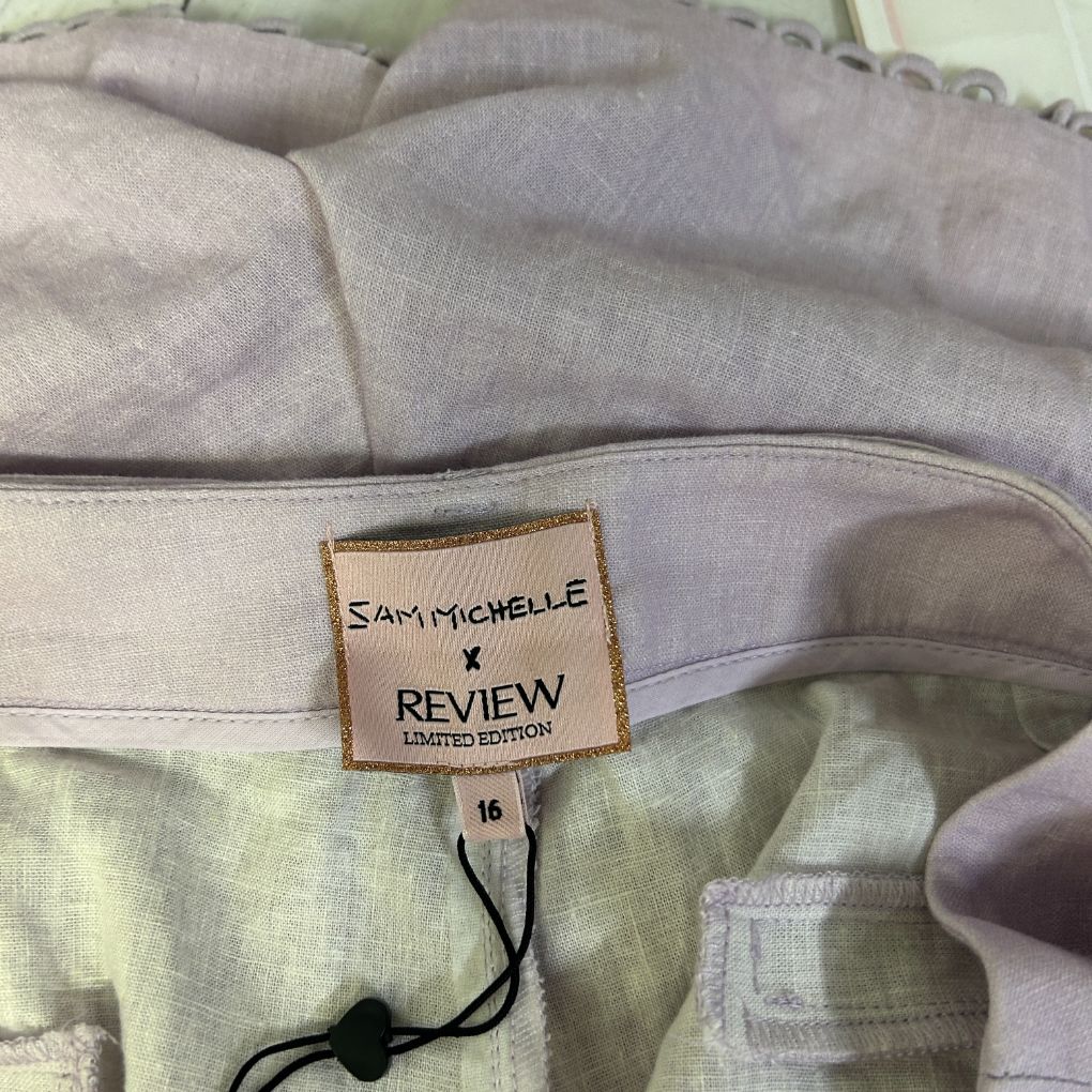 Pale green and lavender linen shirt detail view
