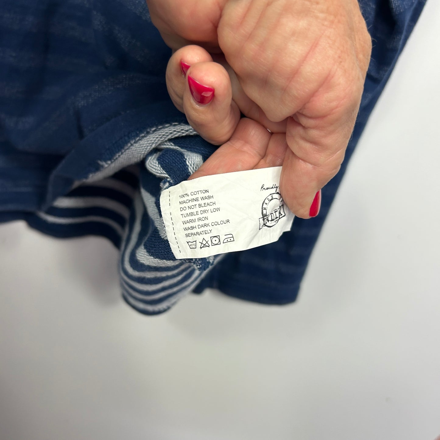 Navy striped socks label detail view