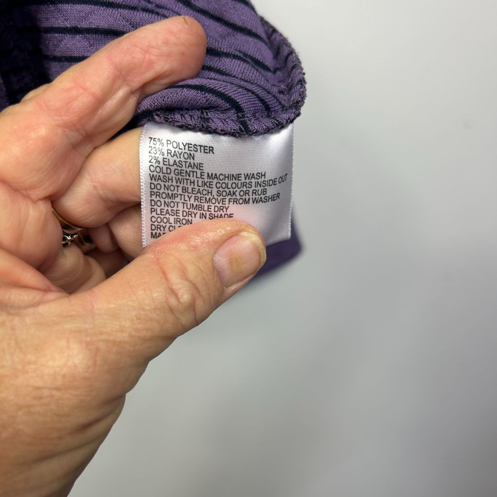 Purple striped fabric detail view