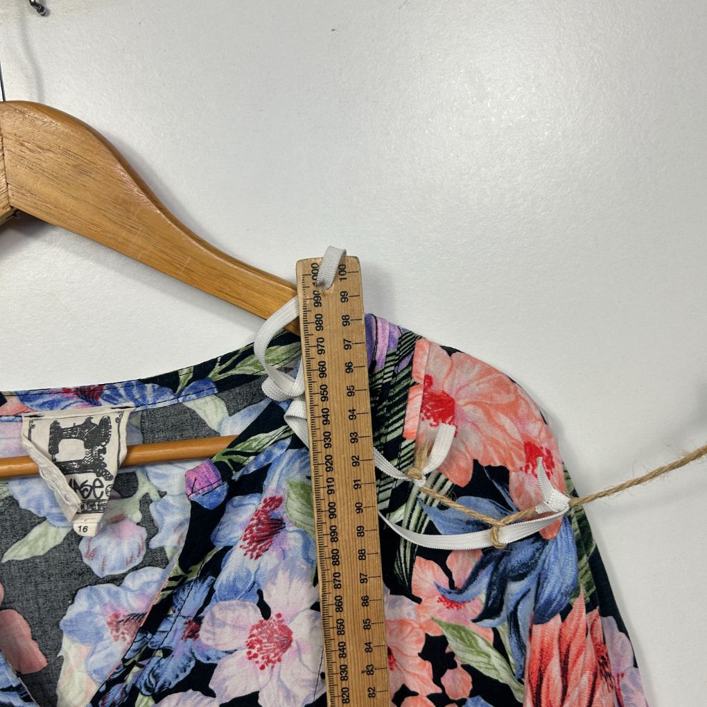 Floral top front view with measuring tape