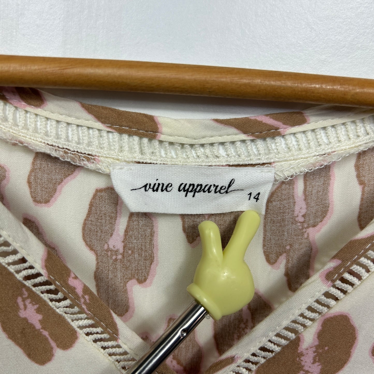 Cream and brown leaf print long sleeve top label and detail view