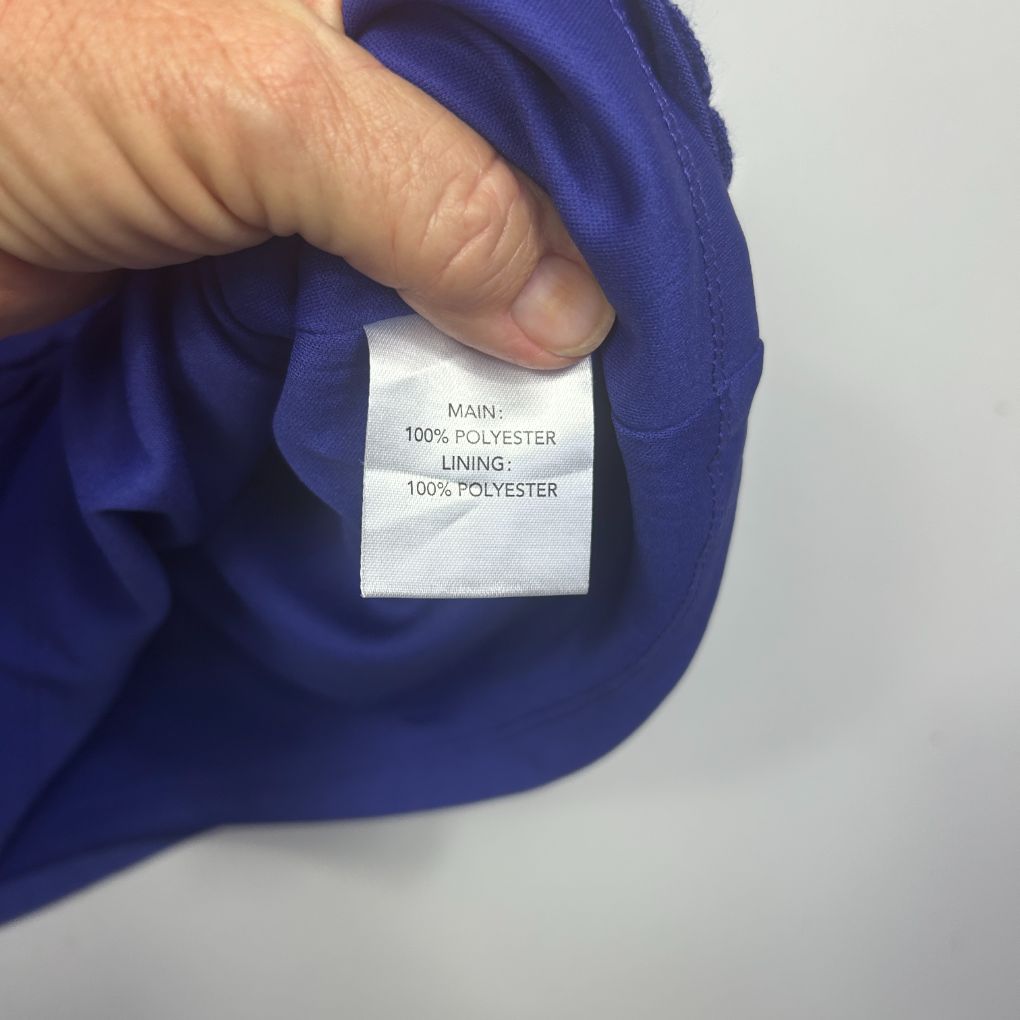 Blue garment care label detail view