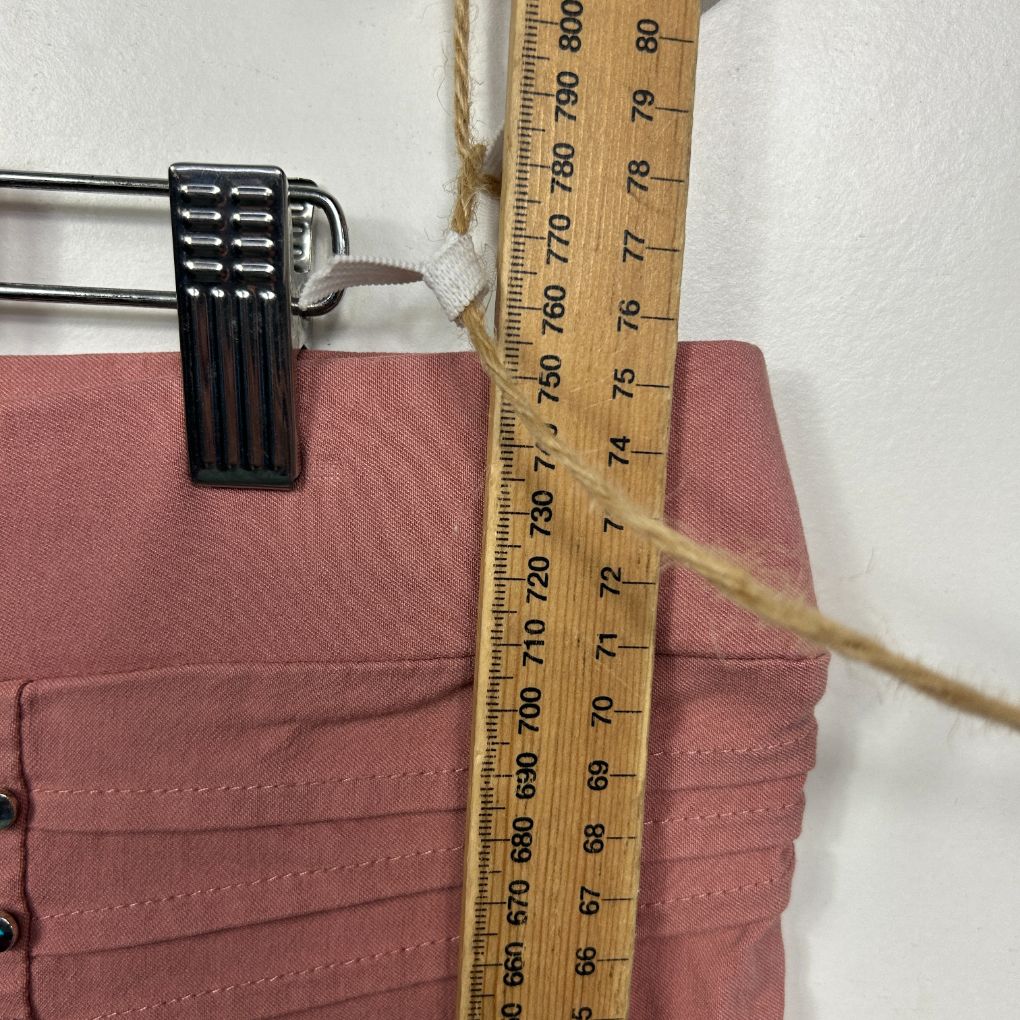 Mauve pants front view with measuring tape