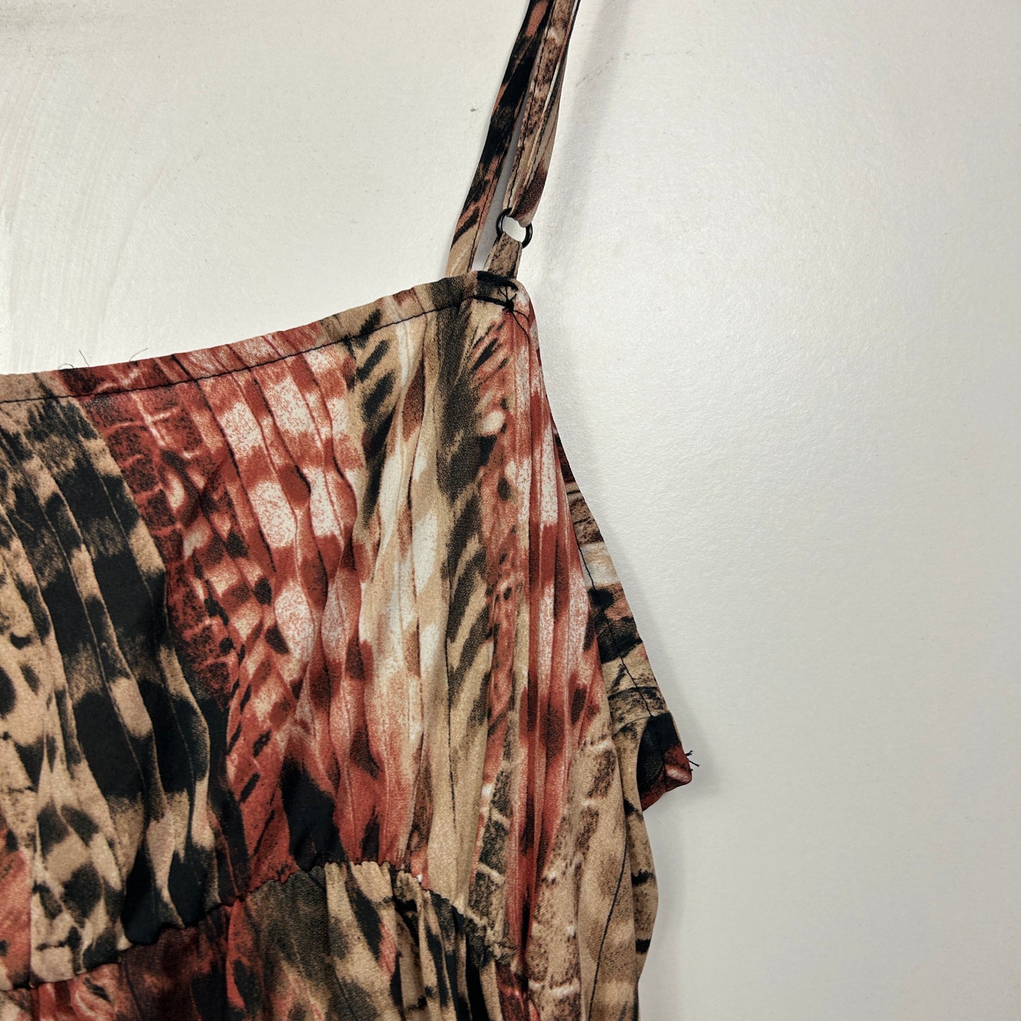 Brown and red patterned cami top detail view