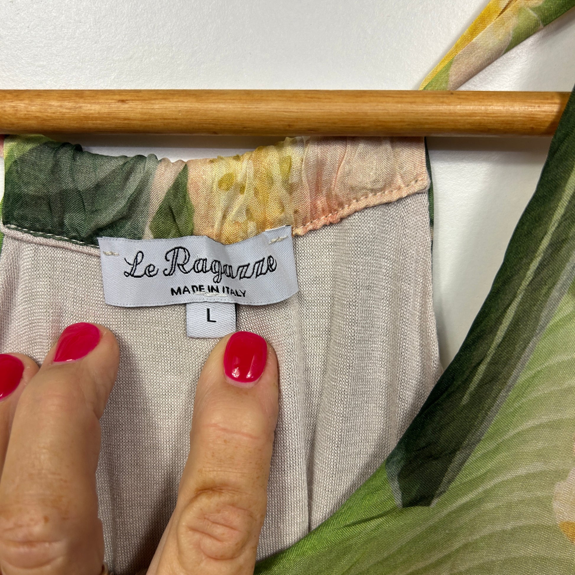 Cream and green floral top label detail view