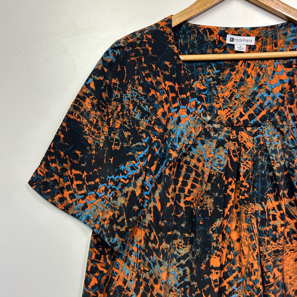 Orange and black abstract patterned t-shirt front view