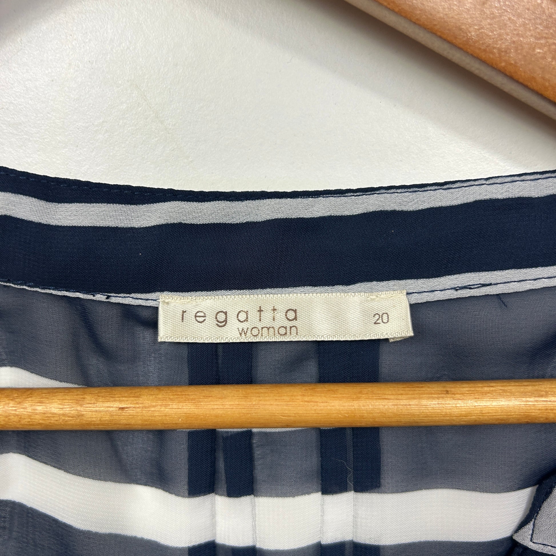 Navy and white striped top label detail view