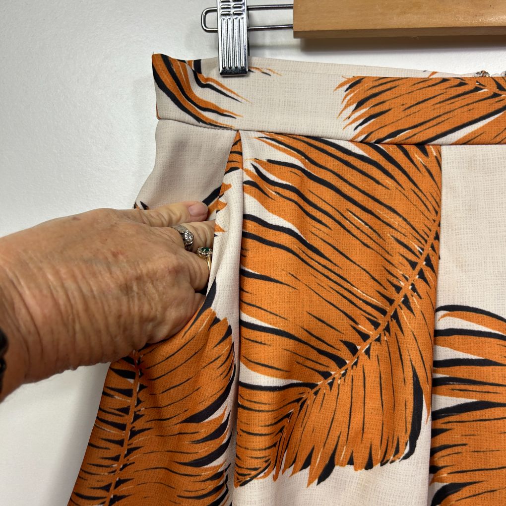 Orange tiger stripe print shirt detail view