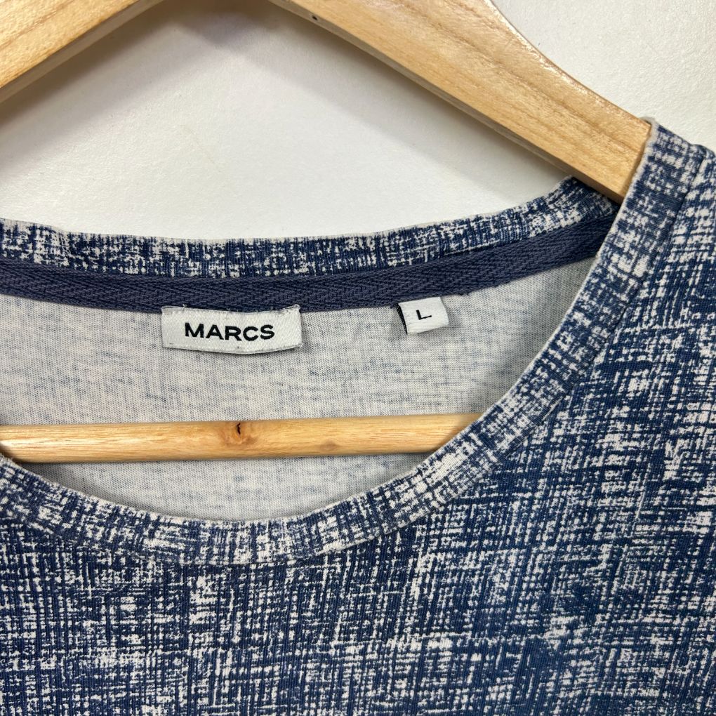 Navy textured knit top front view with label detail