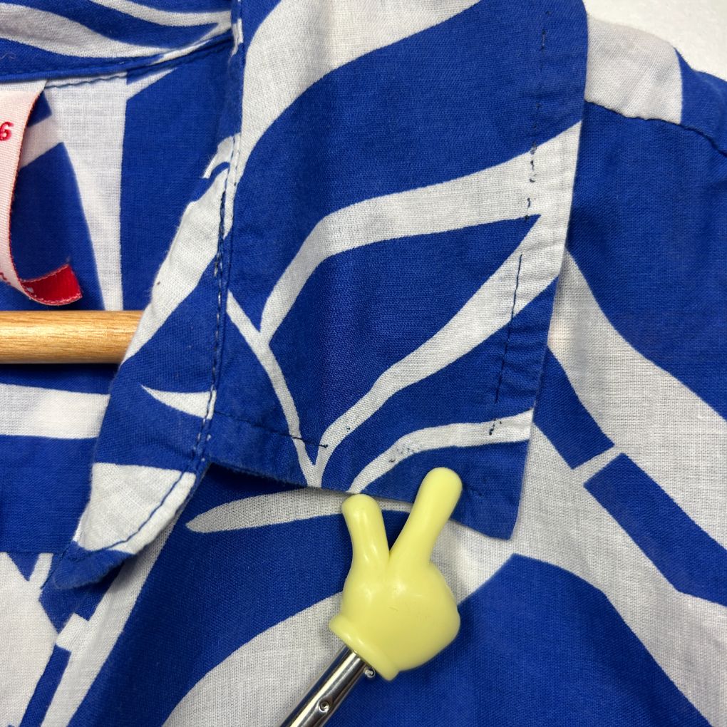 Blue and white striped shirt detail view