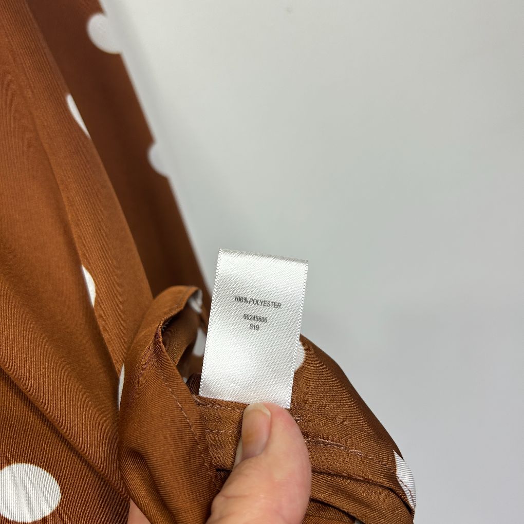 Brown jacket label detail view