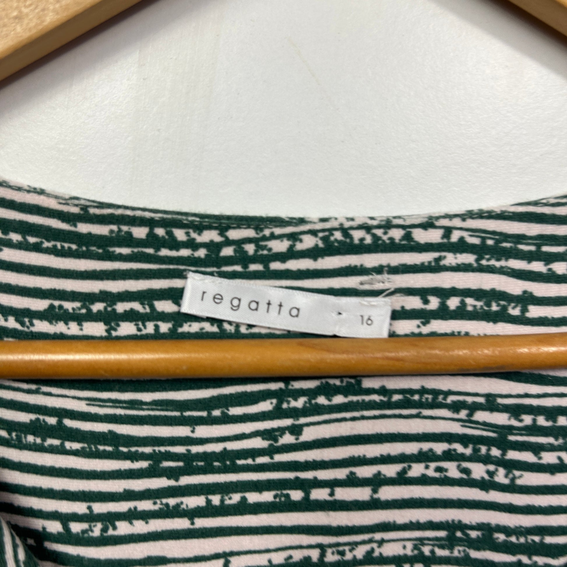 Green and white striped top label detail view