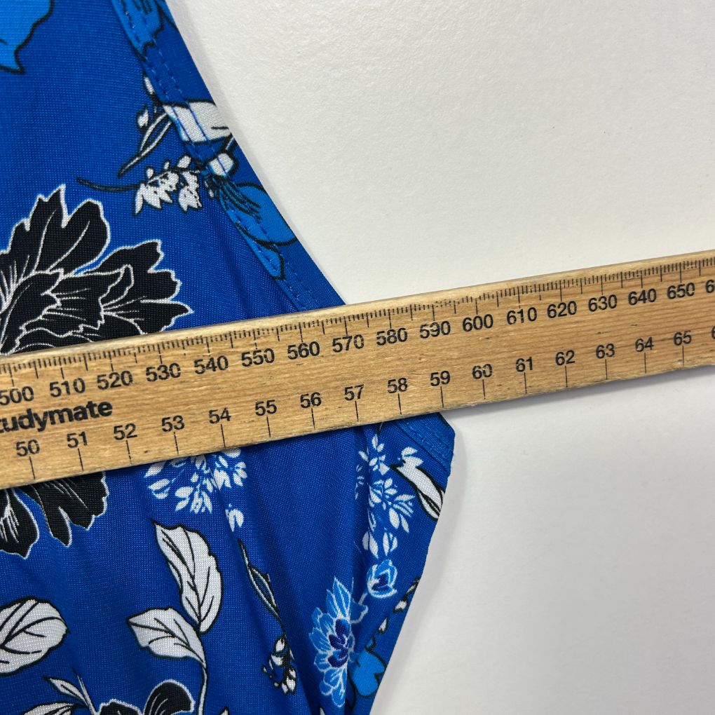 Blue floral dress with measuring tape detail view