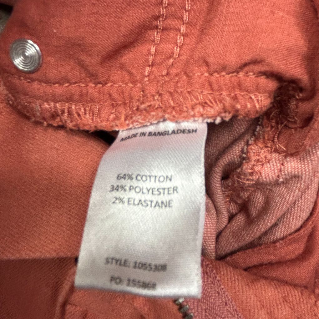 Rust cotton blend shorts label detail view
