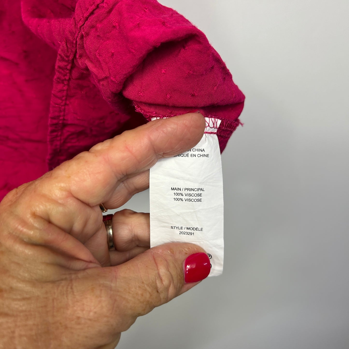 Pink jacket label detail view