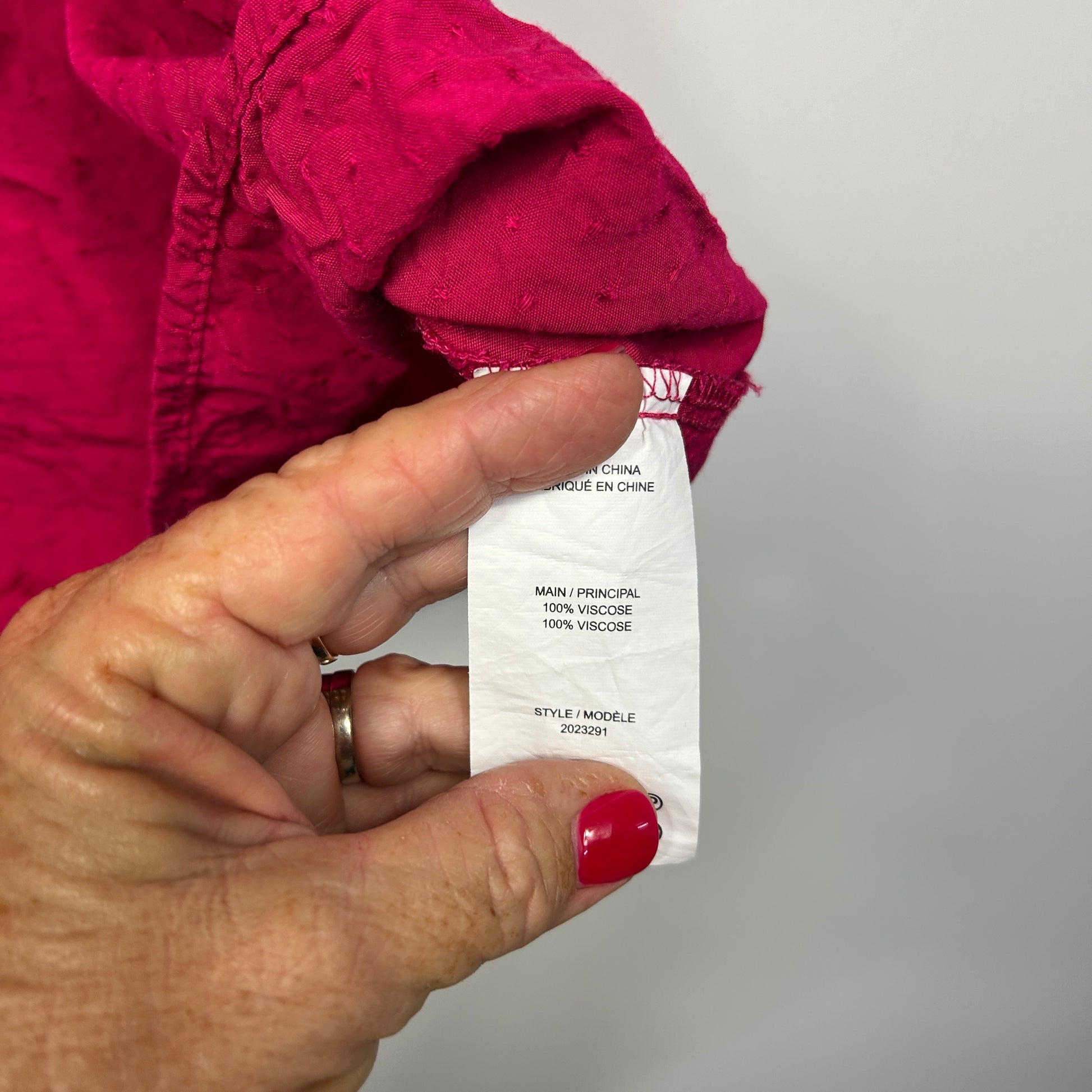 Pink jacket label detail view