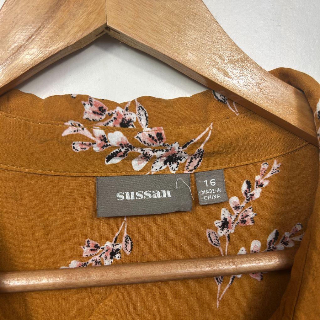 Mustard yellow floral long sleeve top detail view