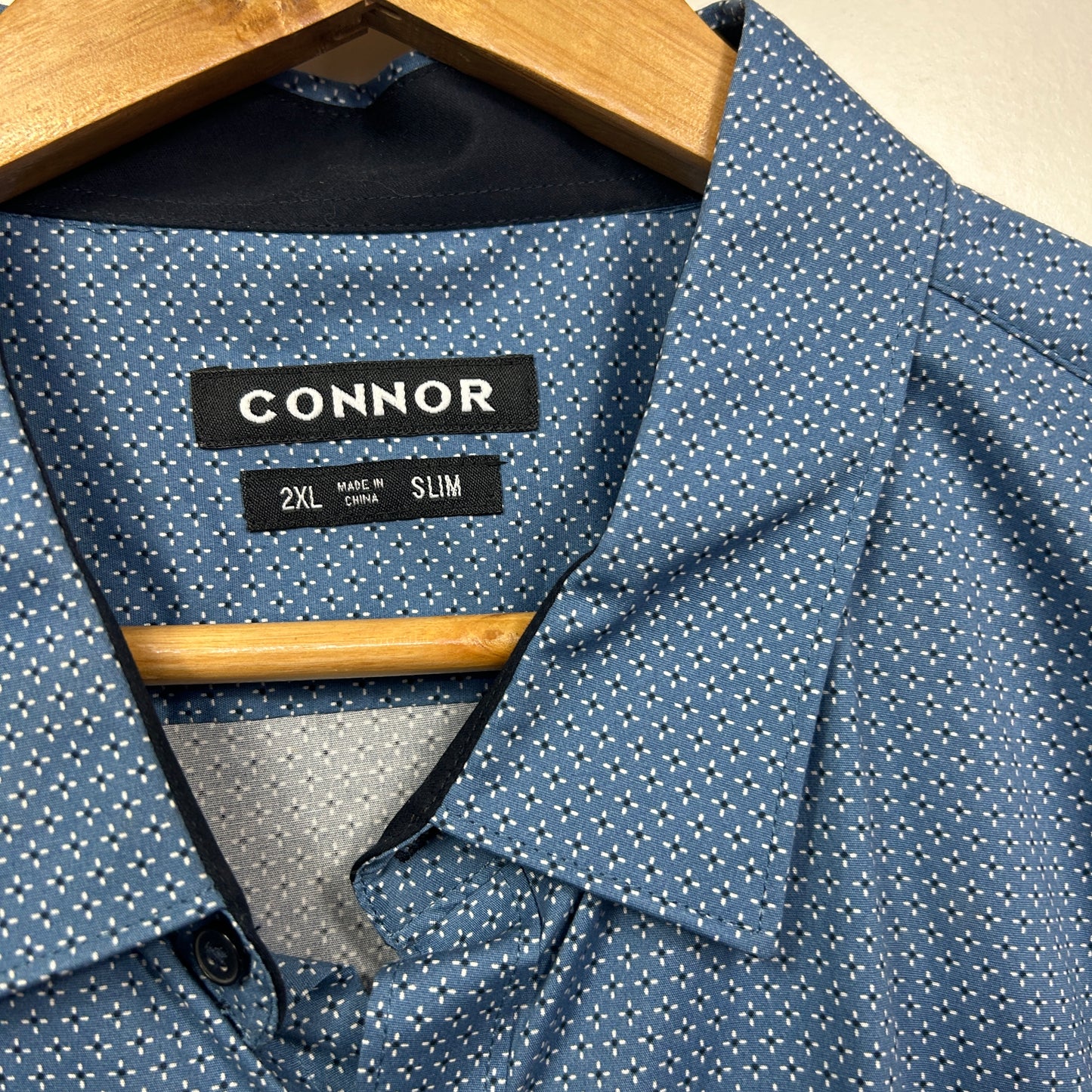 Blue shirt front view with dot pattern