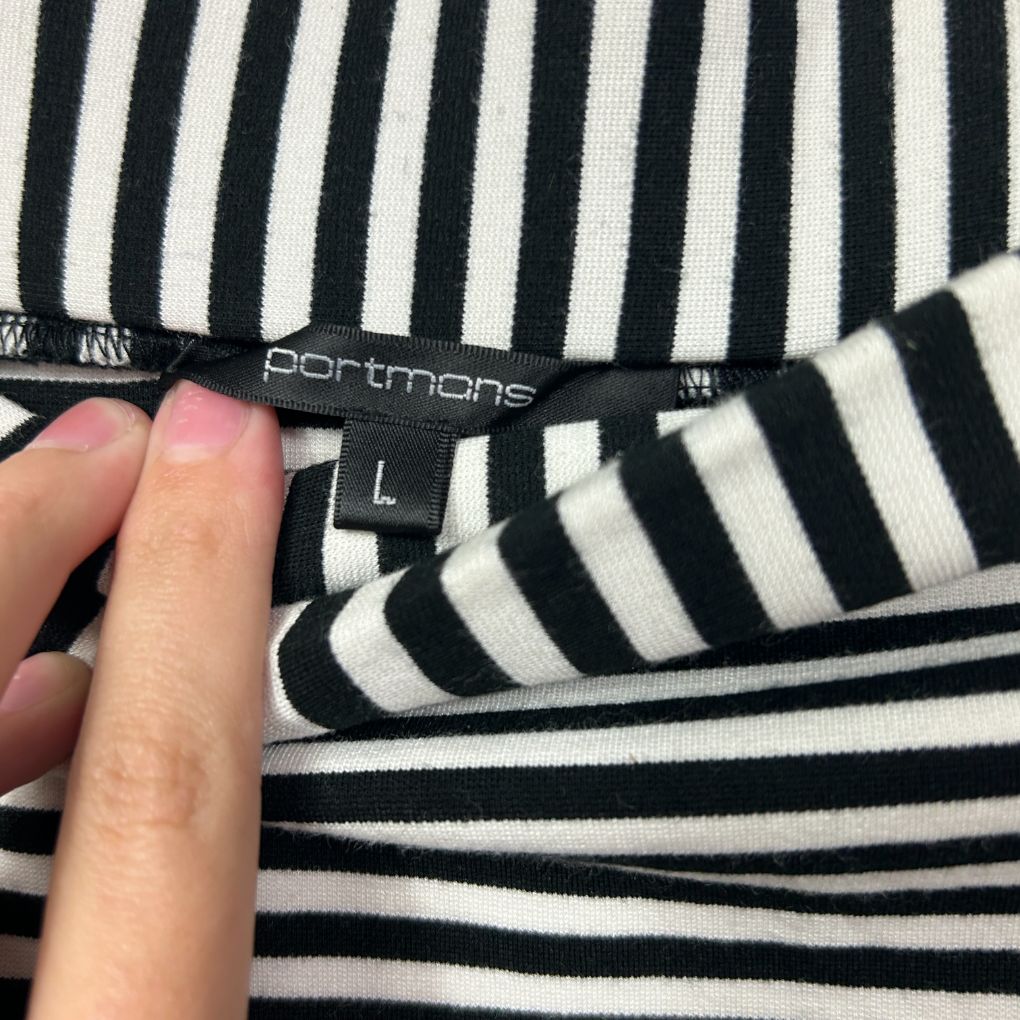 Black and white striped top label detail view