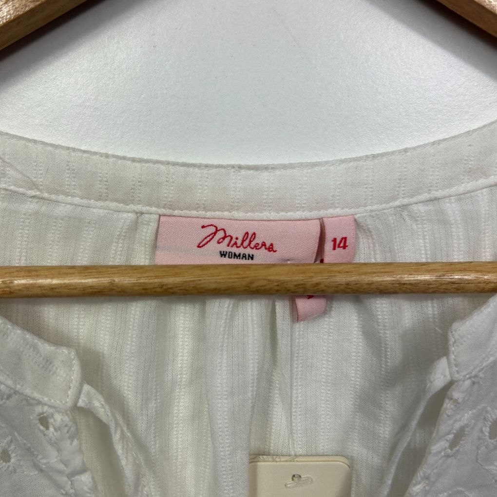 White long sleeve top label detail view