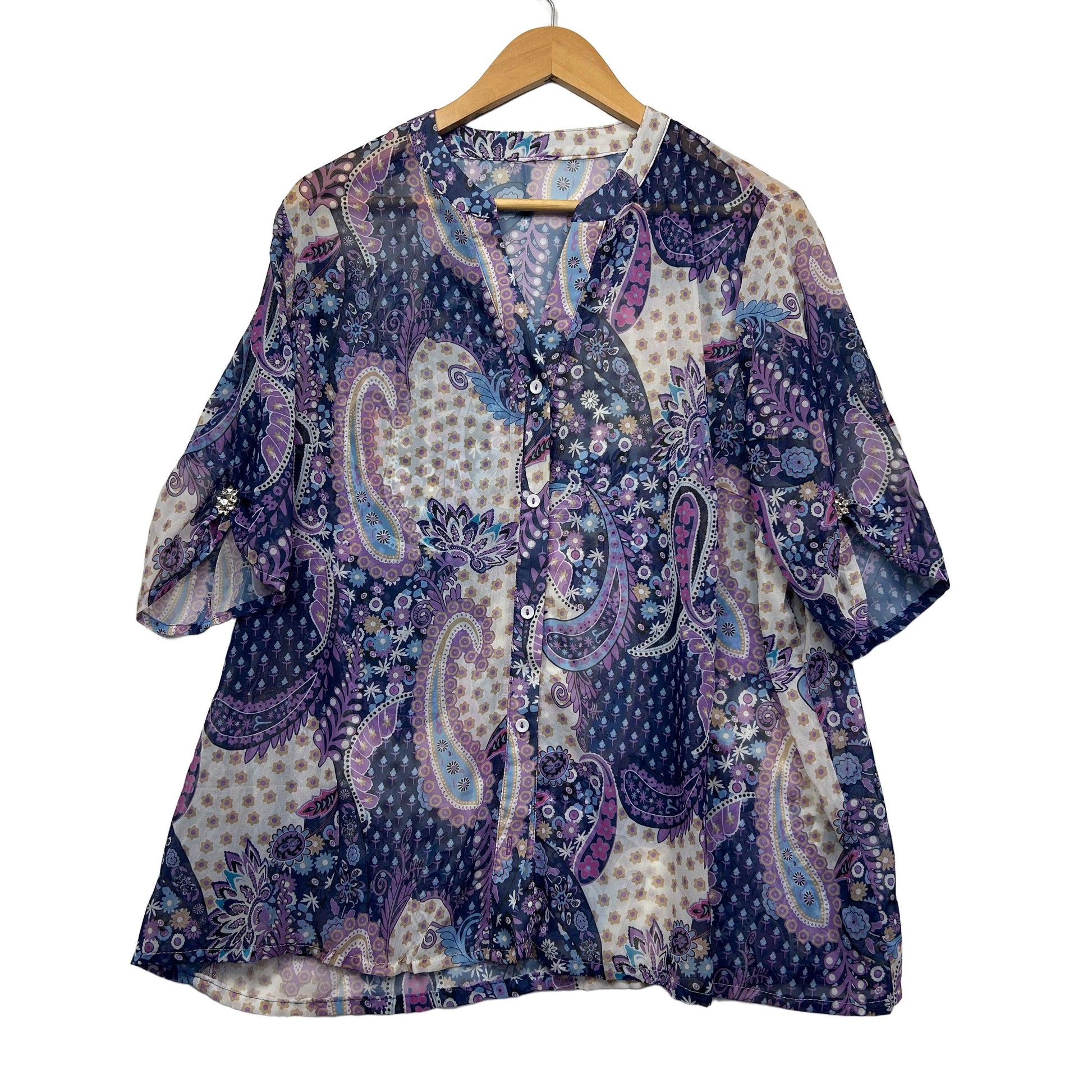 Purple paisley patterned button-up shirt dress front view