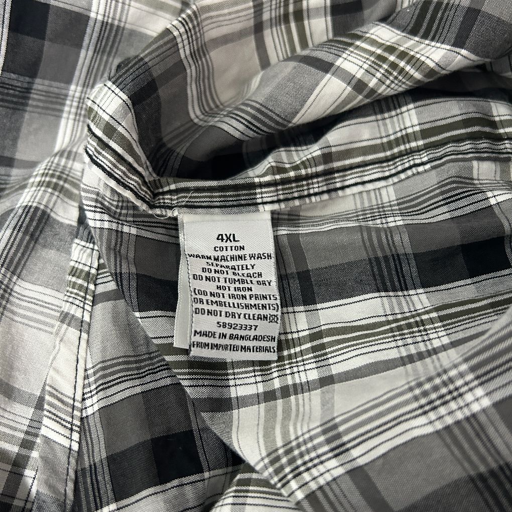 Black and white plaid shirt label detail view