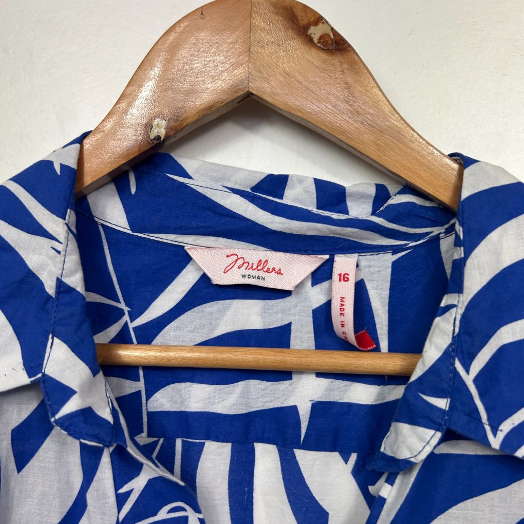 Blue and white striped top front view on wooden hanger