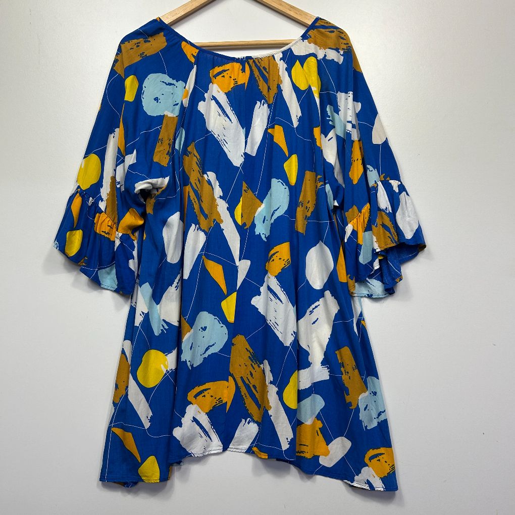 Blue dress with yellow and white abstract pattern front view