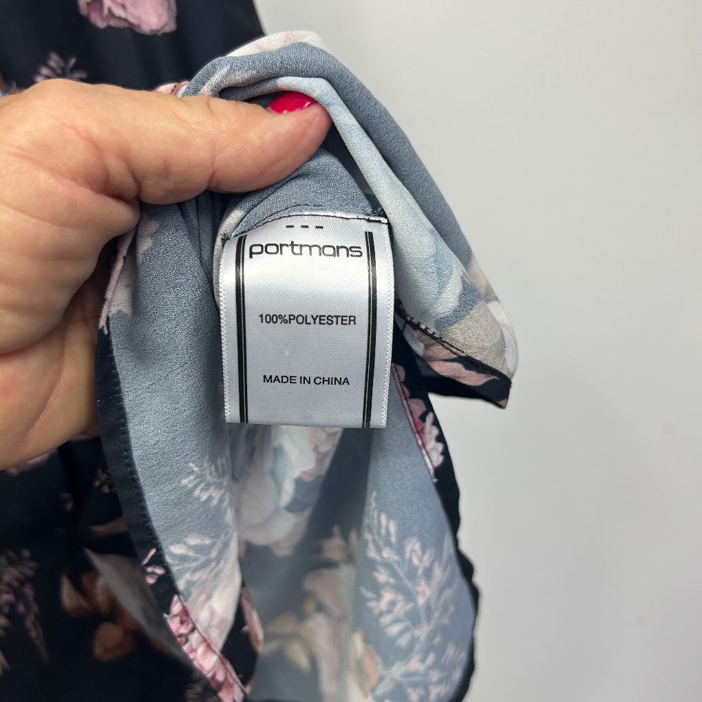 Grey polyester top label detail view