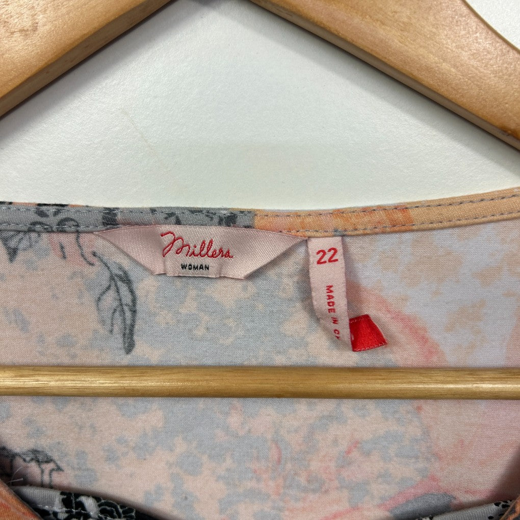 Beige floral garment label detail view