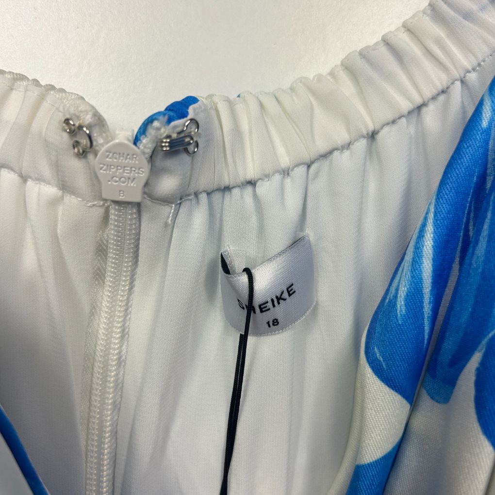 White and blue tracksuit jacket detail view
