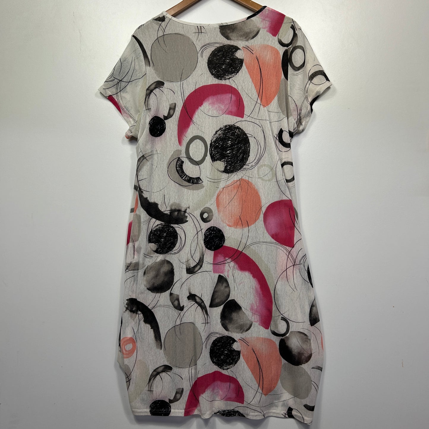Grey dress with black and pink circular graphic pattern front view