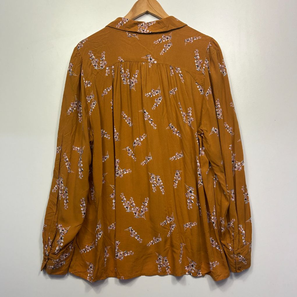 Mustard yellow blouse with floral print front view