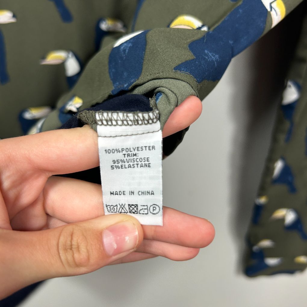 Navy and grey camouflage jacket label detail