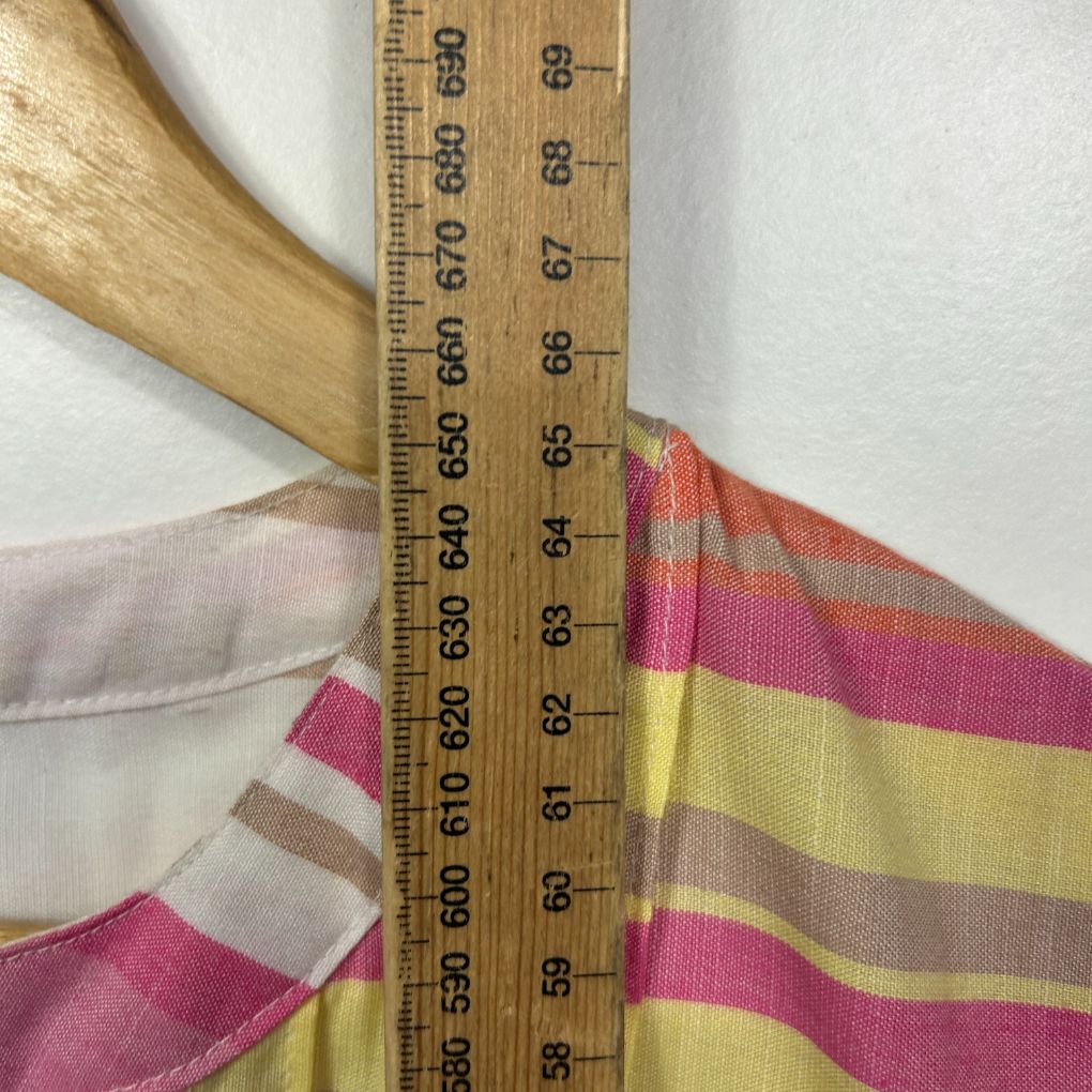 Striped fabric detail view with measuring ruler