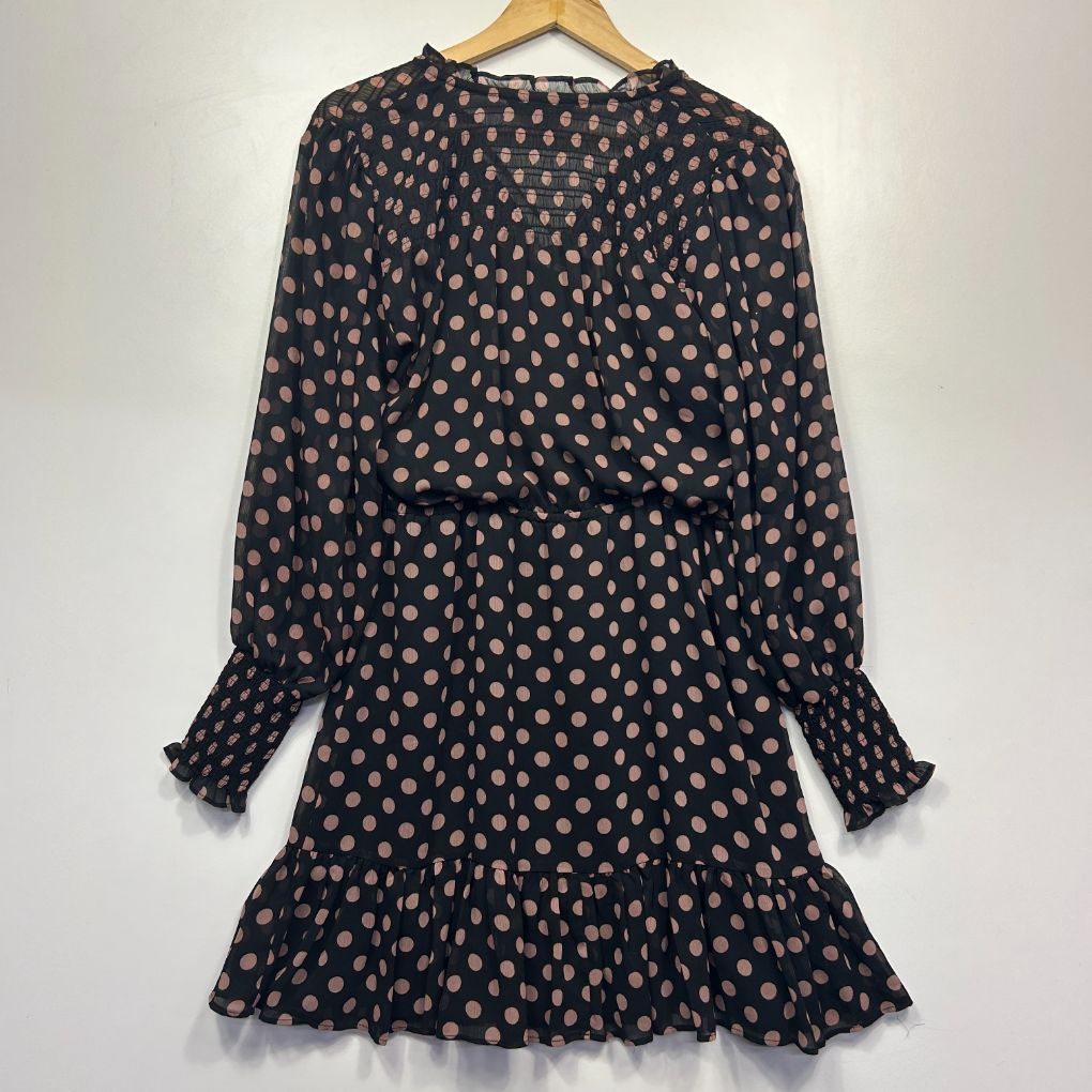Black polka dot dress front view
