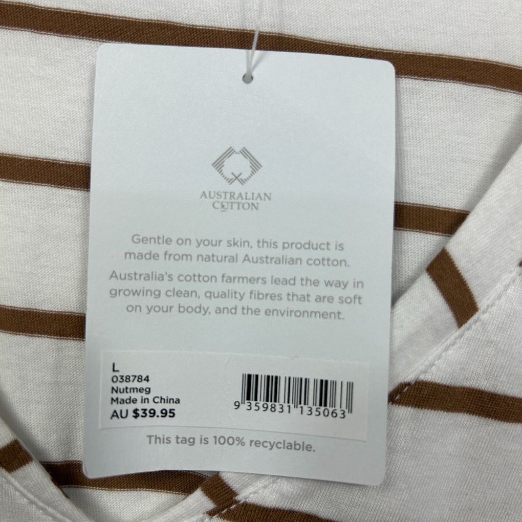 White cotton top with brown striped detail label view