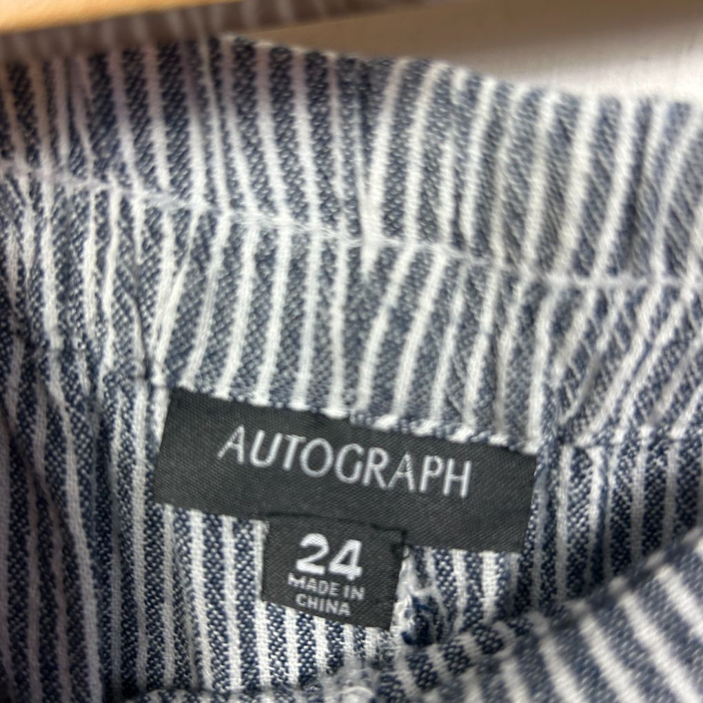 Navy and white striped shirt label detail view